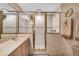 Bathroom with shower, vanity, and tiled flooring at 1695 Pinellas Bayway S # D1, Tierra Verde, FL 33715