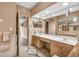 Elegant bathroom with double vanity and large mirror at 1695 Pinellas Bayway S # D1, Tierra Verde, FL 33715