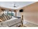 Spacious bedroom with a king-size bed and large window at 1695 Pinellas Bayway S # D1, Tierra Verde, FL 33715