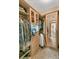 Large walk-in closet with ample shelving and hanging space at 1695 Pinellas Bayway S # D1, Tierra Verde, FL 33715
