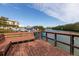 Wooden community dock with seating overlooking the water at 1695 Pinellas Bayway S # D1, Tierra Verde, FL 33715