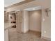 Bright hallway with tile floors and access to other rooms at 1695 Pinellas Bayway S # D1, Tierra Verde, FL 33715