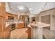Well-equipped kitchen featuring stainless steel appliances and an island at 1695 Pinellas Bayway S # D1, Tierra Verde, FL 33715