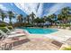 Relaxing community pool with lounge chairs and ample space at 1695 Pinellas Bayway S # D1, Tierra Verde, FL 33715