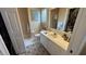 Bathroom features updated vanity, and a walk-in shower at 1743 Arabian Ln, Palm Harbor, FL 34685