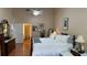 Spacious bedroom with king-size bed and en-suite bathroom at 1743 Arabian Ln, Palm Harbor, FL 34685