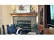 Cozy corner fireplace with decorative mantel at 1743 Arabian Ln, Palm Harbor, FL 34685
