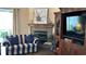 Fireplace with built-in shelving at 1743 Arabian Ln, Palm Harbor, FL 34685