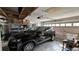Garage with car and additional storage at 1743 Arabian Ln, Palm Harbor, FL 34685