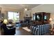 Living room with fireplace and comfortable seating at 1743 Arabian Ln, Palm Harbor, FL 34685