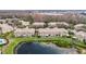 Aerial view of townhouses with lake access at 17523 Stinchar Dr # 17523, Land O Lakes, FL 34638