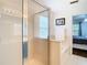 Bathroom with shower, tub, and bedroom access at 17523 Stinchar Dr # 17523, Land O Lakes, FL 34638