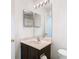 Neat bathroom showcasing a vanity with a sink and mirror at 17523 Stinchar Dr # 17523, Land O Lakes, FL 34638