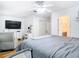 Spacious bedroom with large bed and sitting area at 17523 Stinchar Dr # 17523, Land O Lakes, FL 34638