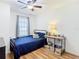 bedroom with a twin-size bed and desk at 17523 Stinchar Dr # 17523, Land O Lakes, FL 34638