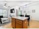 Open concept kitchen and living area with kitchen island at 17523 Stinchar Dr # 17523, Land O Lakes, FL 34638