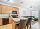 Open concept kitchen with island and living room view at 17523 Stinchar Dr # 17523, Land O Lakes, FL 34638