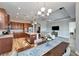 Bright dining room with chandelier and hardwood floors at 1861 Pacific Dunes Dr, Sun City Center, FL 33573