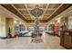 Spacious lobby with a large chandelier and Christmas tree at 1861 Pacific Dunes Dr, Sun City Center, FL 33573