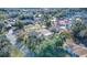 An aerial view of a home nestled amongst other houses at 195 Rusk Cir, Spring Hill, FL 34606