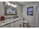 Single vanity bathroom with granite countertop and shower/tub combo at 195 Rusk Cir, Spring Hill, FL 34606