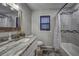 Single vanity bathroom with granite countertop and shower/tub combo at 195 Rusk Cir, Spring Hill, FL 34606