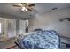Cozy bedroom with a double bed and ceiling fan at 195 Rusk Cir, Spring Hill, FL 34606