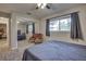 Guest bedroom with mirrored closet doors and window views at 195 Rusk Cir, Spring Hill, FL 34606