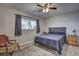 Spacious bedroom with a ceiling fan and large window at 195 Rusk Cir, Spring Hill, FL 34606
