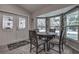 Bright dining area with a round table and four chairs near patio doors at 195 Rusk Cir, Spring Hill, FL 34606