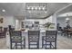 Spacious kitchen island with granite countertops and seating for three at 195 Rusk Cir, Spring Hill, FL 34606