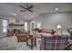 Comfortable living room with a stone fireplace and plenty of natural light at 195 Rusk Cir, Spring Hill, FL 34606