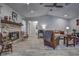 Living room with stone fireplace and vaulted ceiling at 195 Rusk Cir, Spring Hill, FL 34606
