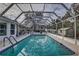 Refreshing screened pool perfect for relaxation at 195 Rusk Cir, Spring Hill, FL 34606