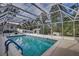 Inviting screened pool with ample deck space at 195 Rusk Cir, Spring Hill, FL 34606