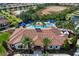 Community clubhouse with tile roof and pool area at 20011 Umbria Hill Dr, Tampa, FL 33647