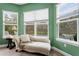 Relaxing sunroom features a chaise lounge and picturesque views at 20011 Umbria Hill Dr, Tampa, FL 33647