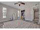 Bright bedroom with large windows, closet, and patterned rug at 3157 Landmark Dr # 411, Clearwater, FL 33761