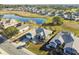 House with a view of the golf course and pond at 326 Caloosa Woods Ln, Sun City Center, FL 33573