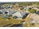 Single-story home with pool and golf course view at 326 Caloosa Woods Ln, Sun City Center, FL 33573