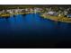 Stunning view of the calm waterfront and neighboring properties at 3614 Rock Royal Dr, Holiday, FL 34691