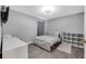 Bedroom with a queen bed and modern decor at 4309 Duncombe Dr, Valrico, FL 33596