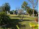 Spacious backyard with lush landscaping at 4415 Great Lakes N Dr, Clearwater, FL 33762