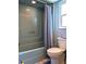 Bathroom with shower/tub combo and toilet at 4415 Great Lakes N Dr, Clearwater, FL 33762
