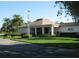 Community clubhouse with ample parking and landscaping at 4415 Great Lakes N Dr, Clearwater, FL 33762