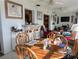 Casual dining area with wooden table and bar stools at 4415 Great Lakes N Dr, Clearwater, FL 33762