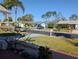 Quiet residential street with well-maintained homes and lush landscaping at 4415 Great Lakes N Dr, Clearwater, FL 33762
