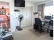 Home office with computer desk, chair, and built-in wardrobe at 4415 Great Lakes N Dr, Clearwater, FL 33762