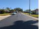 Residential street view with parked cars and homes at 4415 Great Lakes N Dr, Clearwater, FL 33762