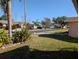 Residential street view showing neighborhood homes at 4415 Great Lakes N Dr, Clearwater, FL 33762